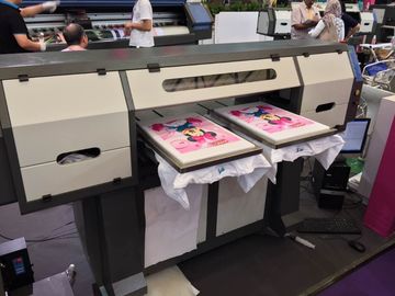 중국 Epson DX5 머리를 가진 t-셔츠 인쇄를 위한 의복 인쇄 기계 TX202에 지시하십시오 협력 업체